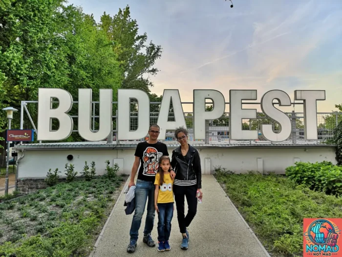 My family in front of the Budapest sign