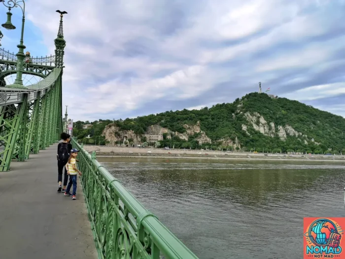my wife and son crossing the Danube river in Budapest